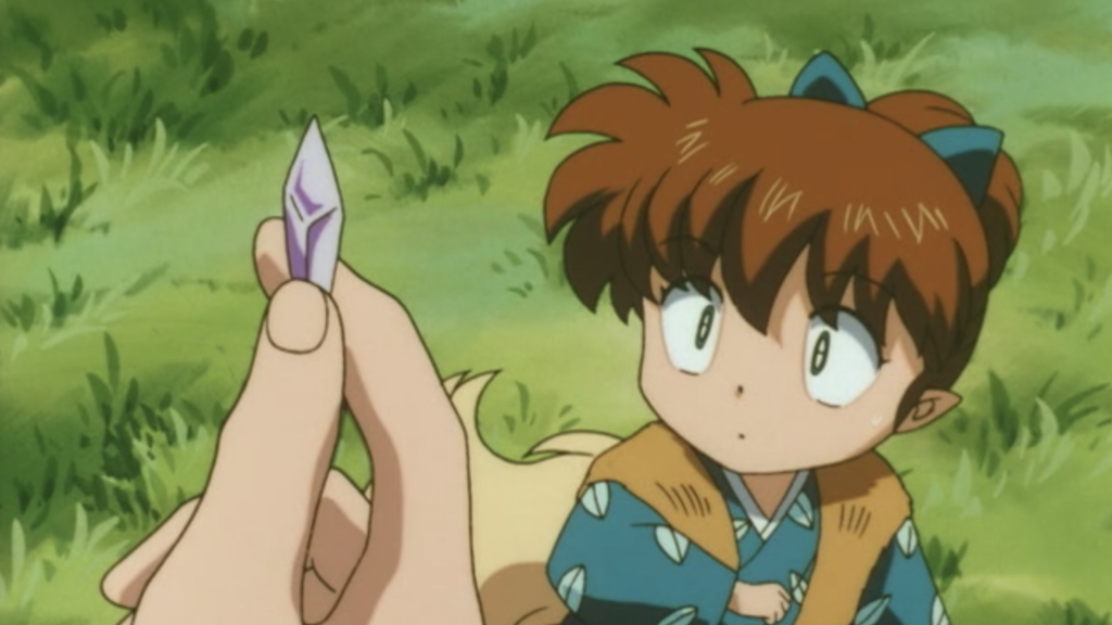 Shippo glares at Satsuki's stone flower