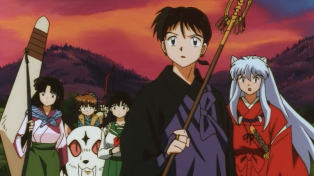 Inuyasha and company surprised to see the village cheering