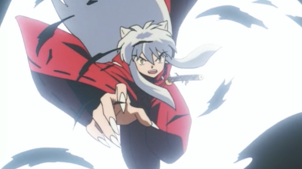 Inuyasha tears through a paper silhouette