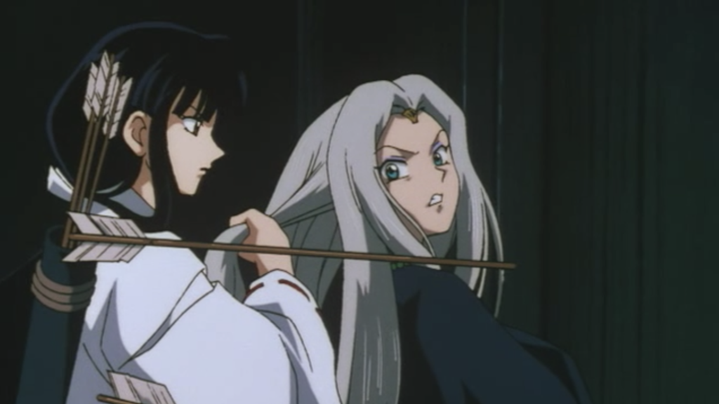 Kikyo pulling Tsubaki's hair