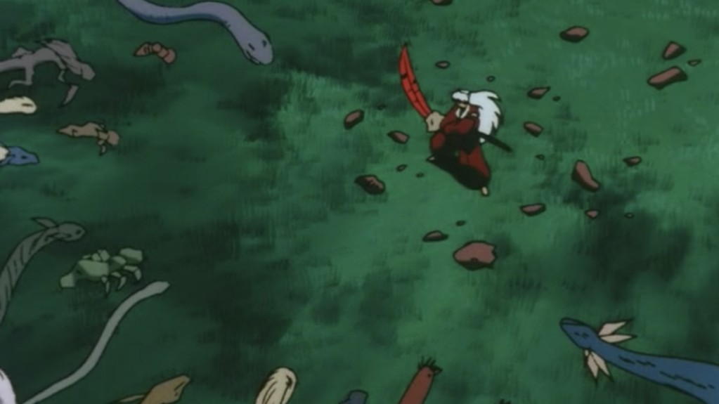 Inuyasha cuts through a demon horde